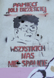 Väggmålning föreställande den mördade aktivisten Jola Brzeska. "Till minnet av Jola Brzeska. Ni kommer inte bränna oss alla."